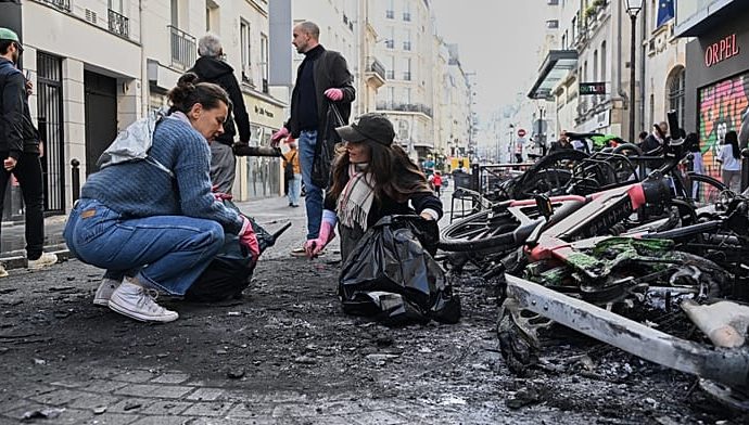 burnt-bicycles,-smashed-windows-and-looted-shops:-trail-of-destruction-across-paris