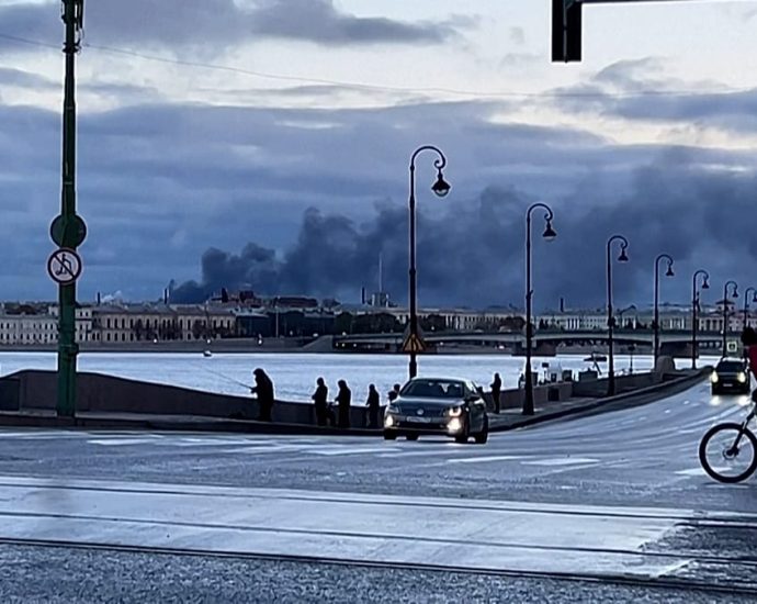 russia:-huge-flames-and-smoke-rise-over-st-petersburg-after-drone-strikes