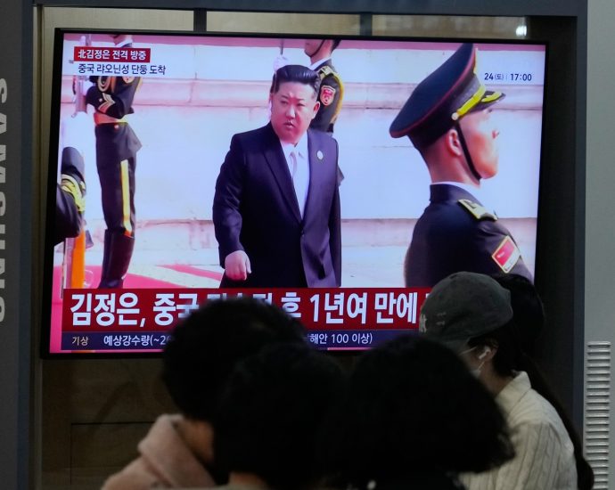 kim-jong-un-visits-china-as-new-border-bridge-signals-expanding-trade