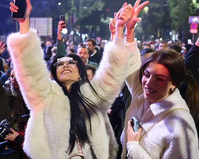 serbia:-crowds-celebrate-in-belgrade-after-vucic-admits-defeat