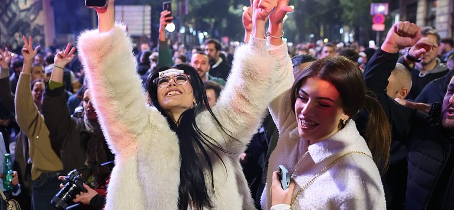 serbia:-crowds-celebrate-in-belgrade-after-vucic-admits-defeat