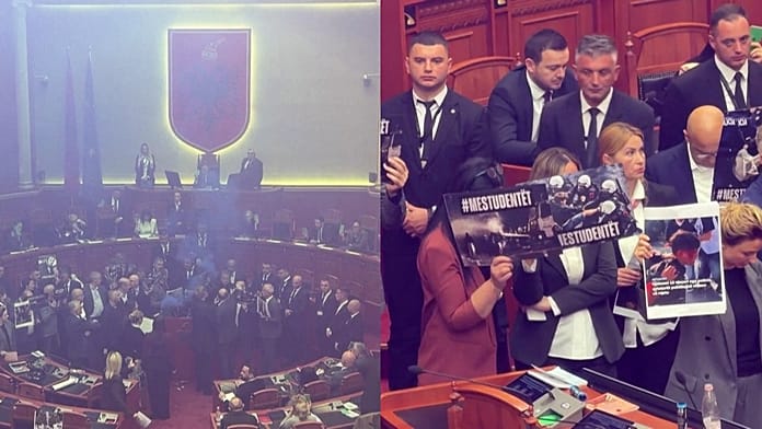 albania:-opposition-mps-disrupt-parliament-with-smoke-flares