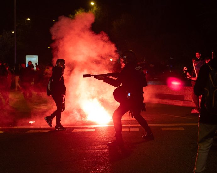 protesters-clash-with-police-after-deadly-train-crash-in-spain